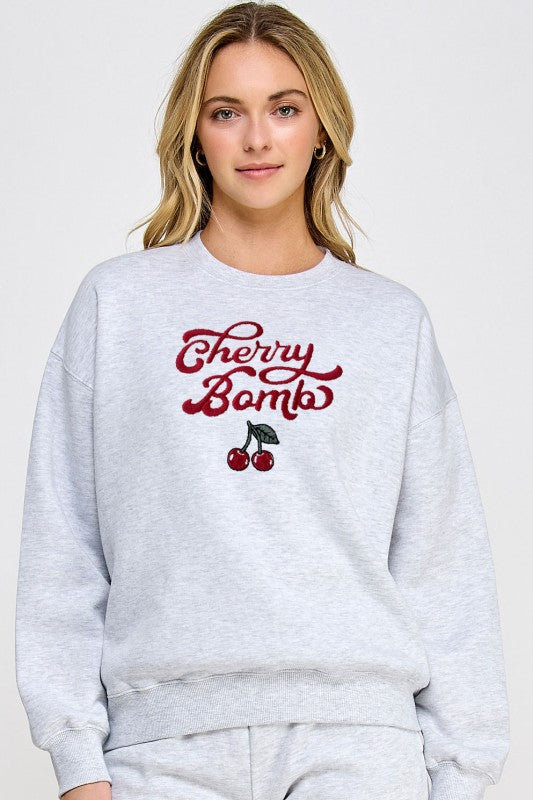 FLEECE BASIC RELAXED FIT CREW NECK SWEATSHIRT WITH CHERRY BOMB EMBROIDERY