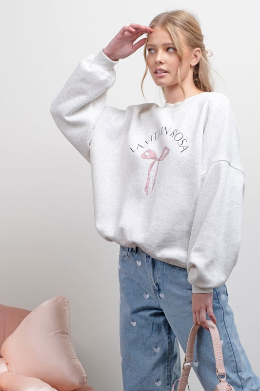 BOW GRAPHIC SWEATSHIRT