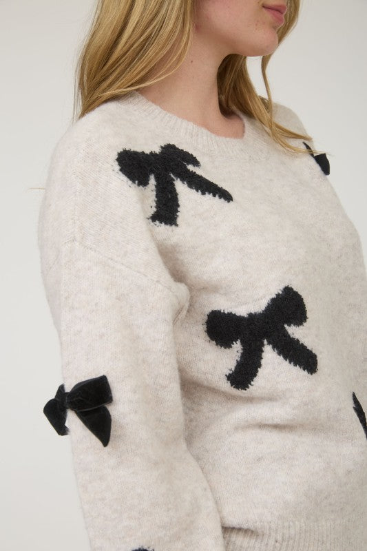 STATEMENT BOW DETAIL SWEATER