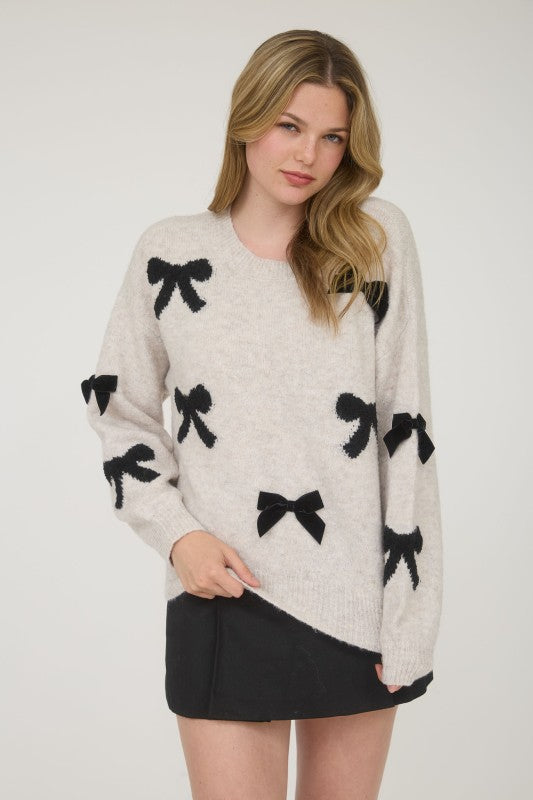 STATEMENT BOW DETAIL SWEATER
