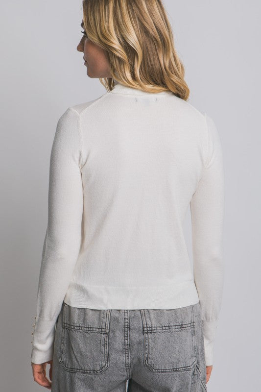 BUTTON SLEEVE DETAIL TURTLENECK