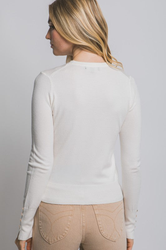 BUTTON SLEEVE DETAIL TURTLENECK