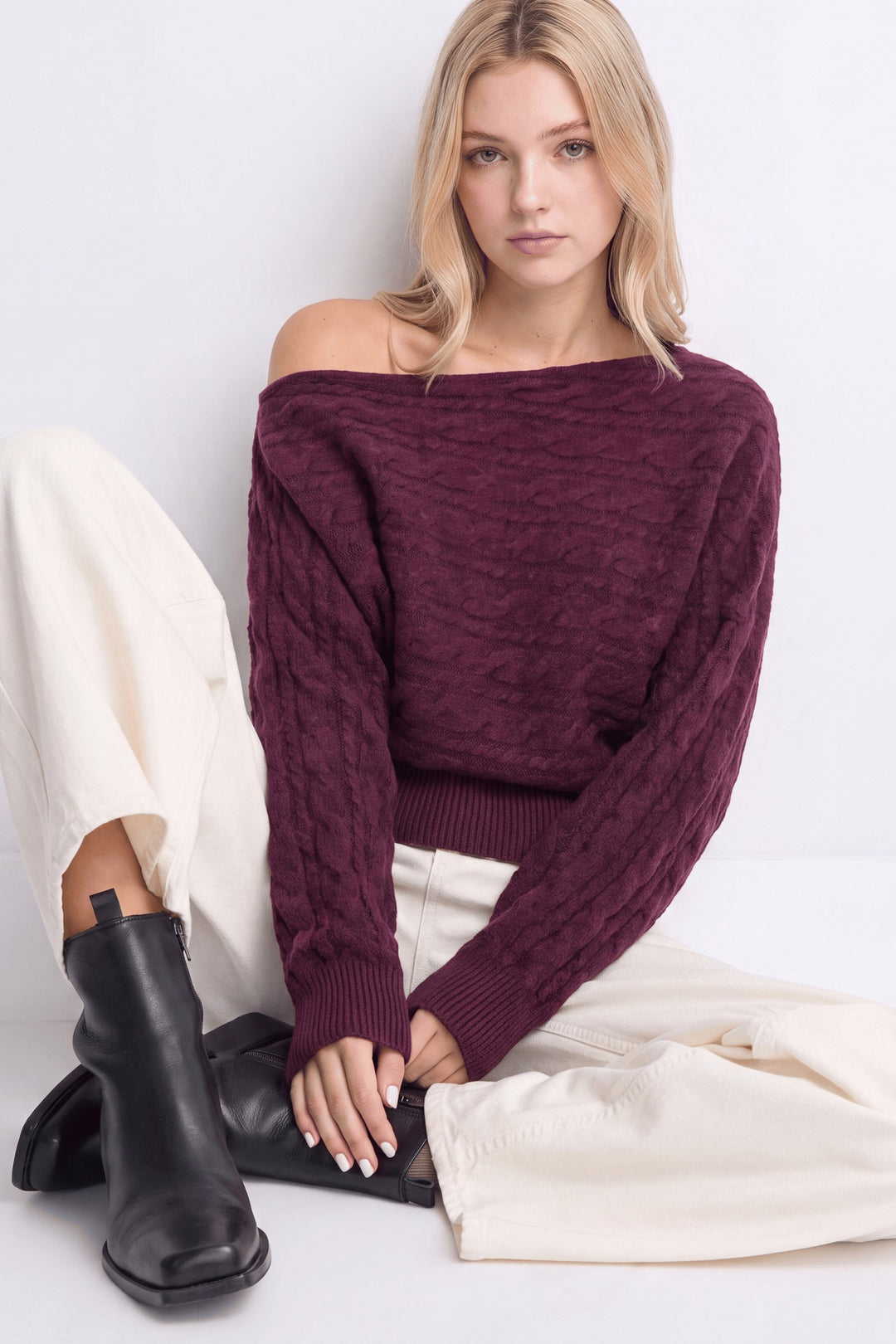 CABLE KNIT ASYMMETRICAL SWEATER